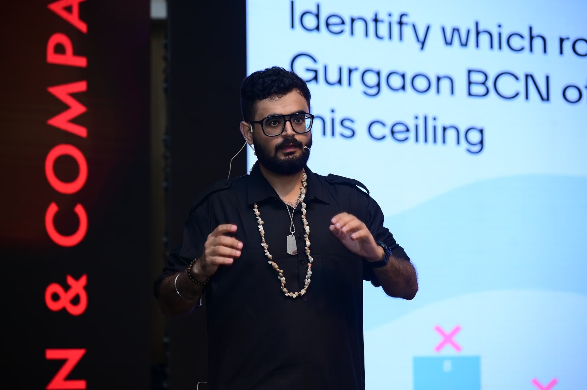 Sagnik Monga hosting a quiz at a company offsite